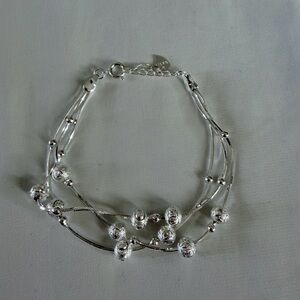 Triple Strand Ball Bead Bracelet Diamond Cut Design